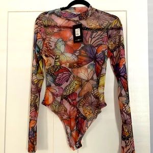 Long sleeve sheer bodysuit from FN.  Never Worn !